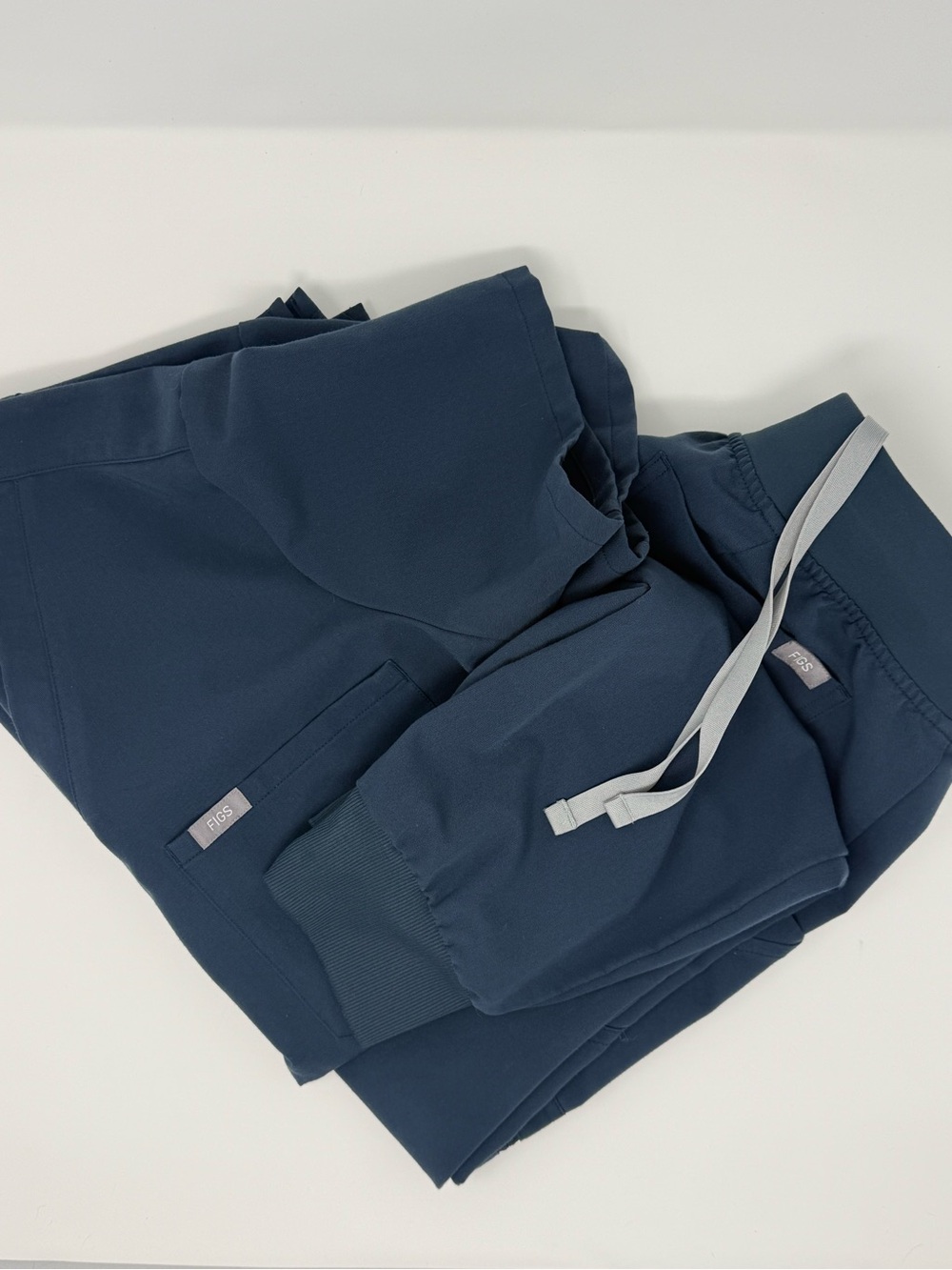 Figs Women's scrubs in dark harborwith Light Gray Drawstrings